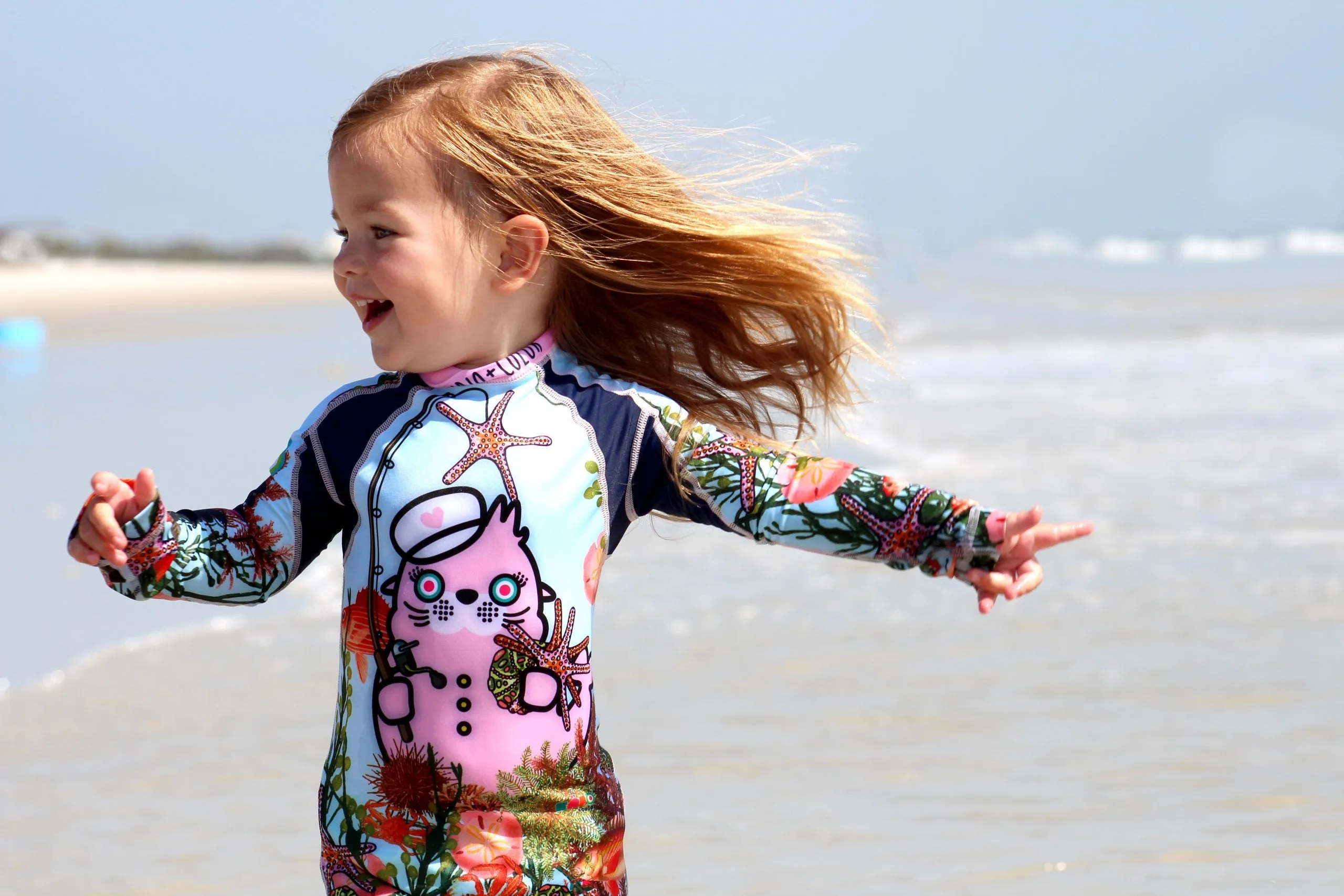 Oceano Sea Lion Girls Long Sleeve Sunsuit