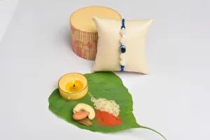White Onyx and Blue Evil Eye Rakhi Set with Roli and Chawal - Handmade Designer Rakhi for Brothers